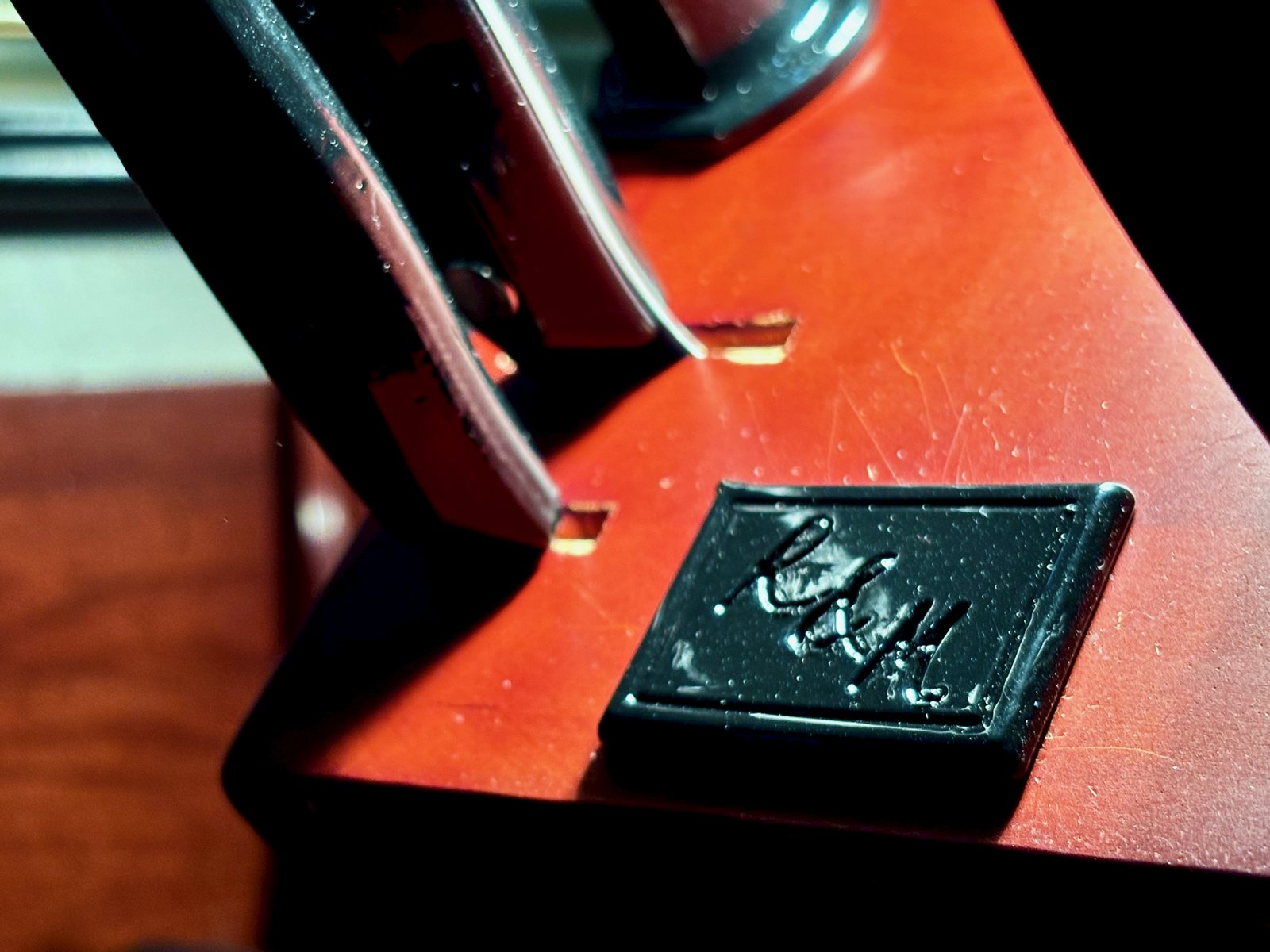Initials plaque on the knife block