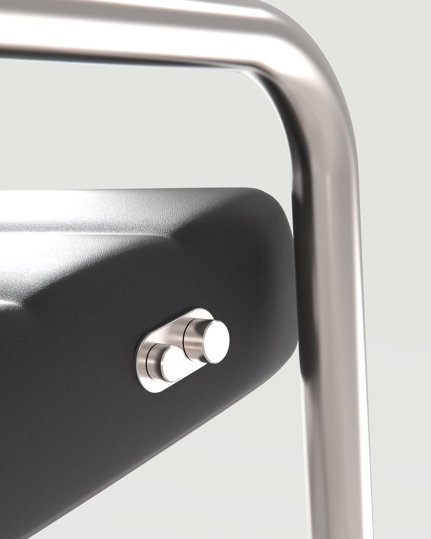 Close-up of the two control knobs set into the side of the seat cushion