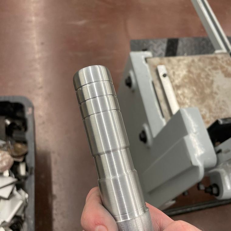 E-brake handle, turned, before parting off